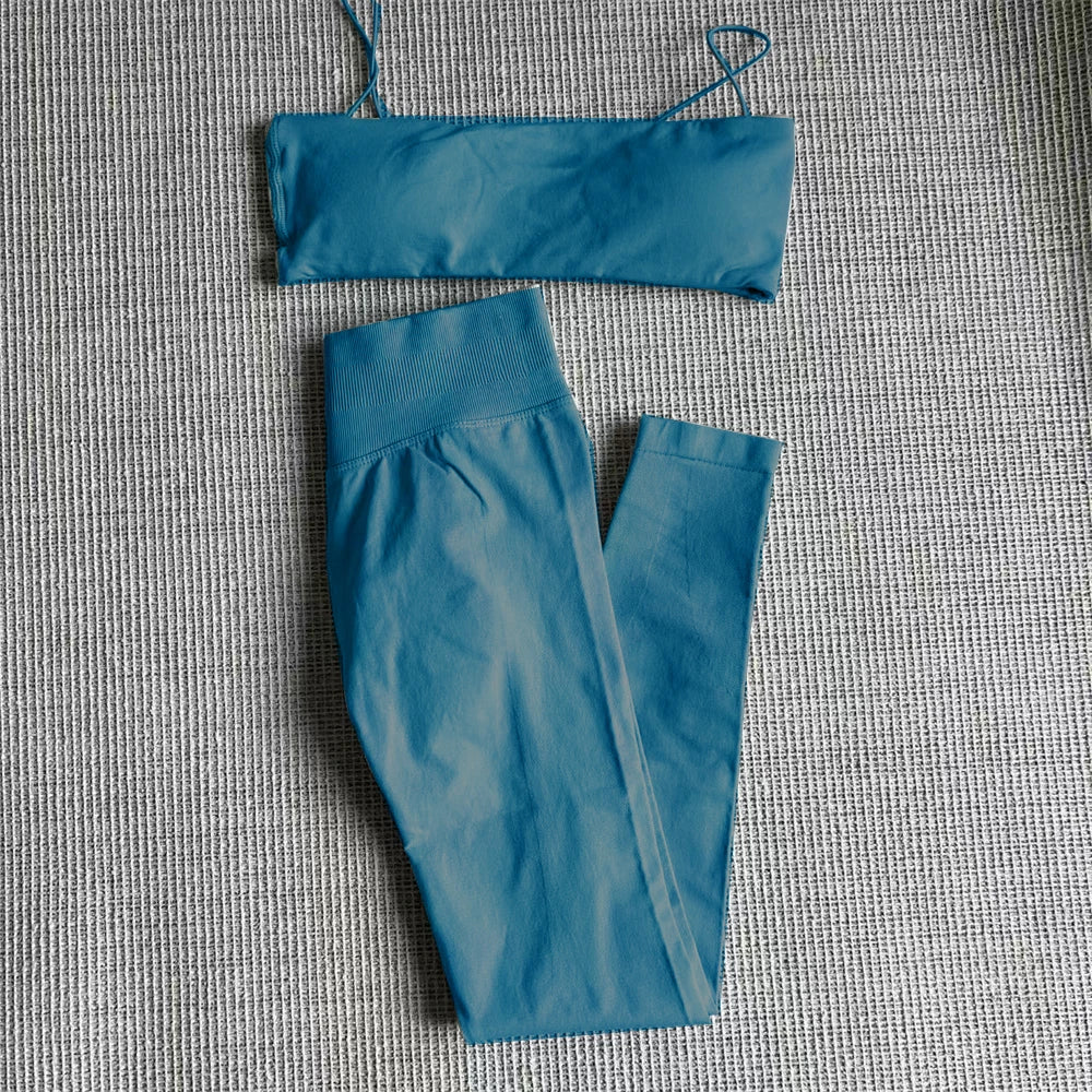 Blue thin strap bra and high-waisted leggings set, laid flat