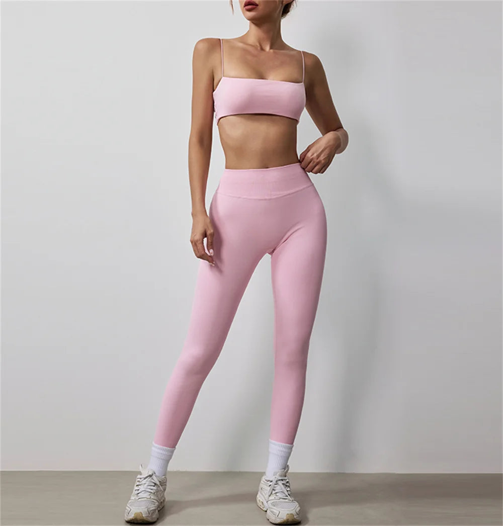 Pink thin strap bra and high-waisted leggings active set, front view