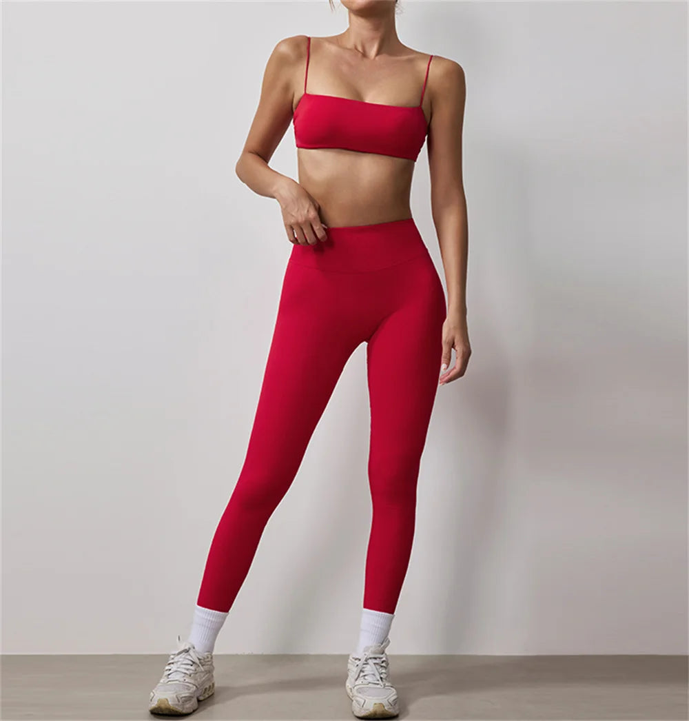 Red thin strap bra and high-waisted leggings active set on model