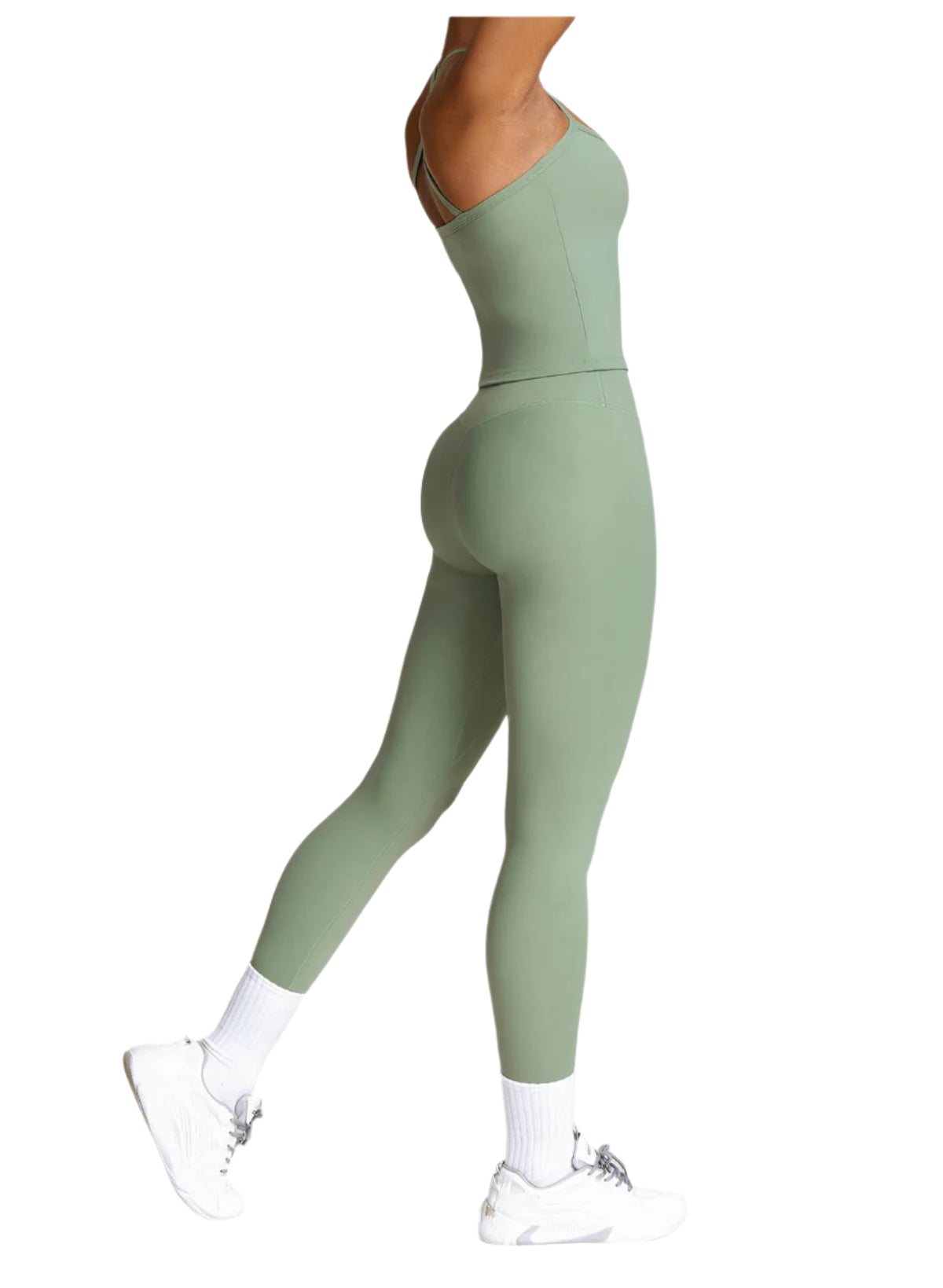 Xooie Fit women's activewear set in soft green featuring a stylish cropped top and form-fitting leggings