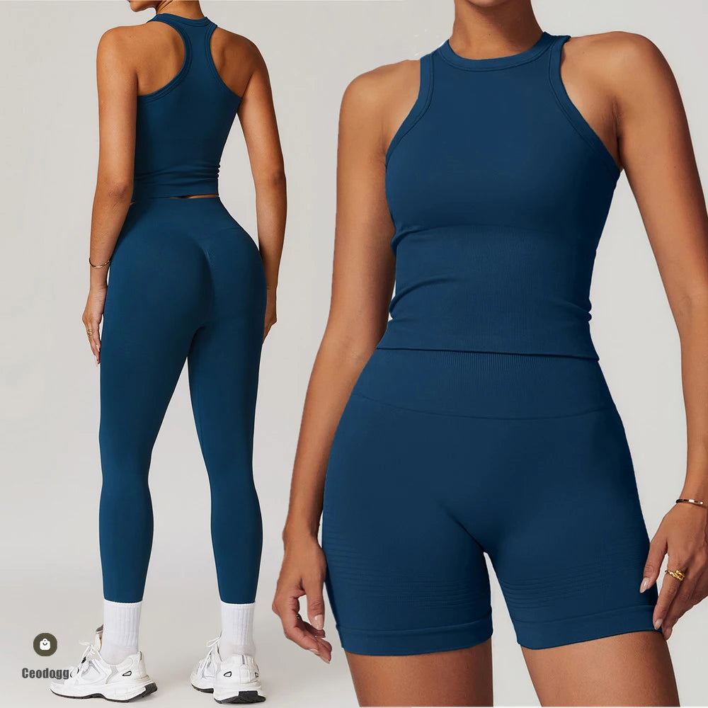 Xooie Fit women's activewear set in navy blue featuring a sleeveless crop top and high-waisted leggings and shorts
