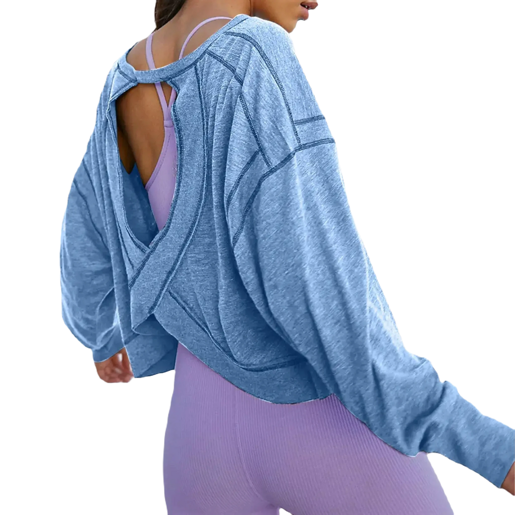 Xooie Fit women's backless workout top in blue with long sleeves and a cropped design open back