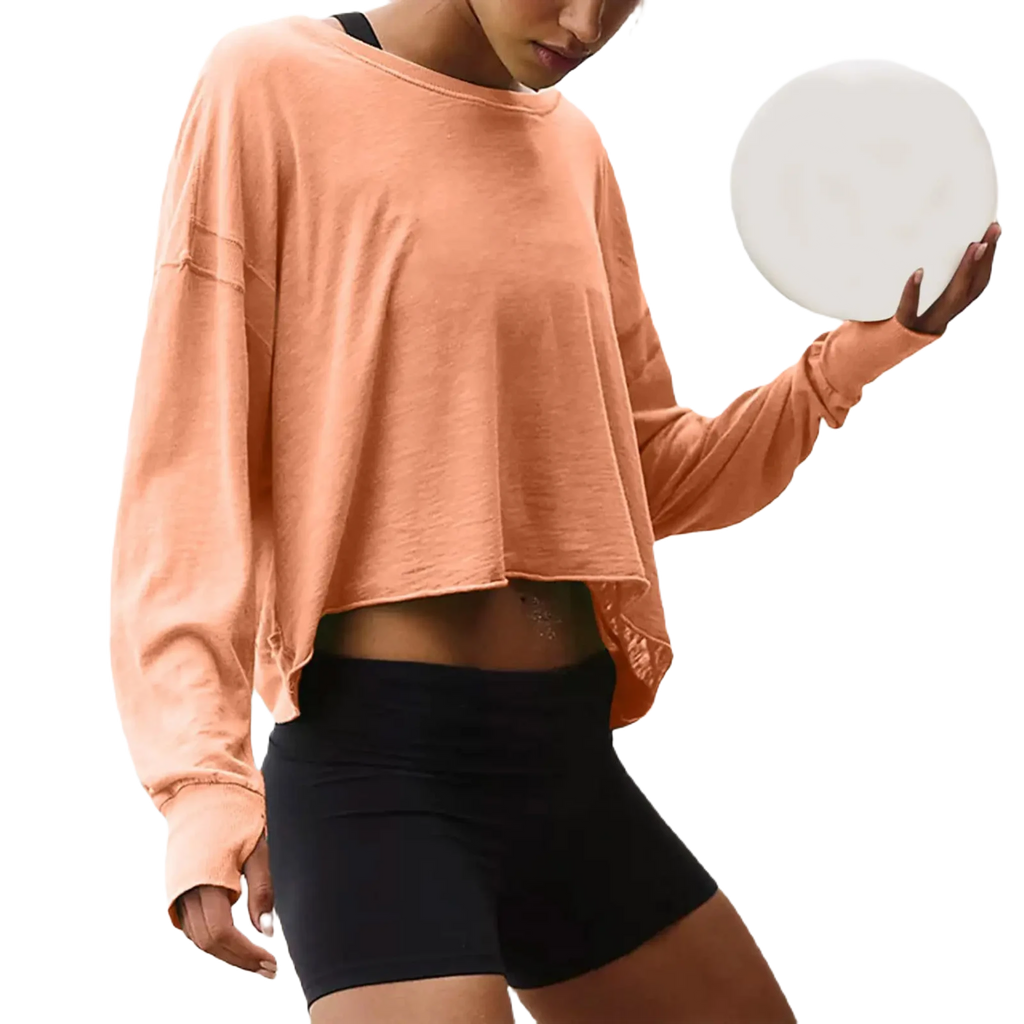 Xooie Fit women's backless workout top in coral with long sleeves and cropped design