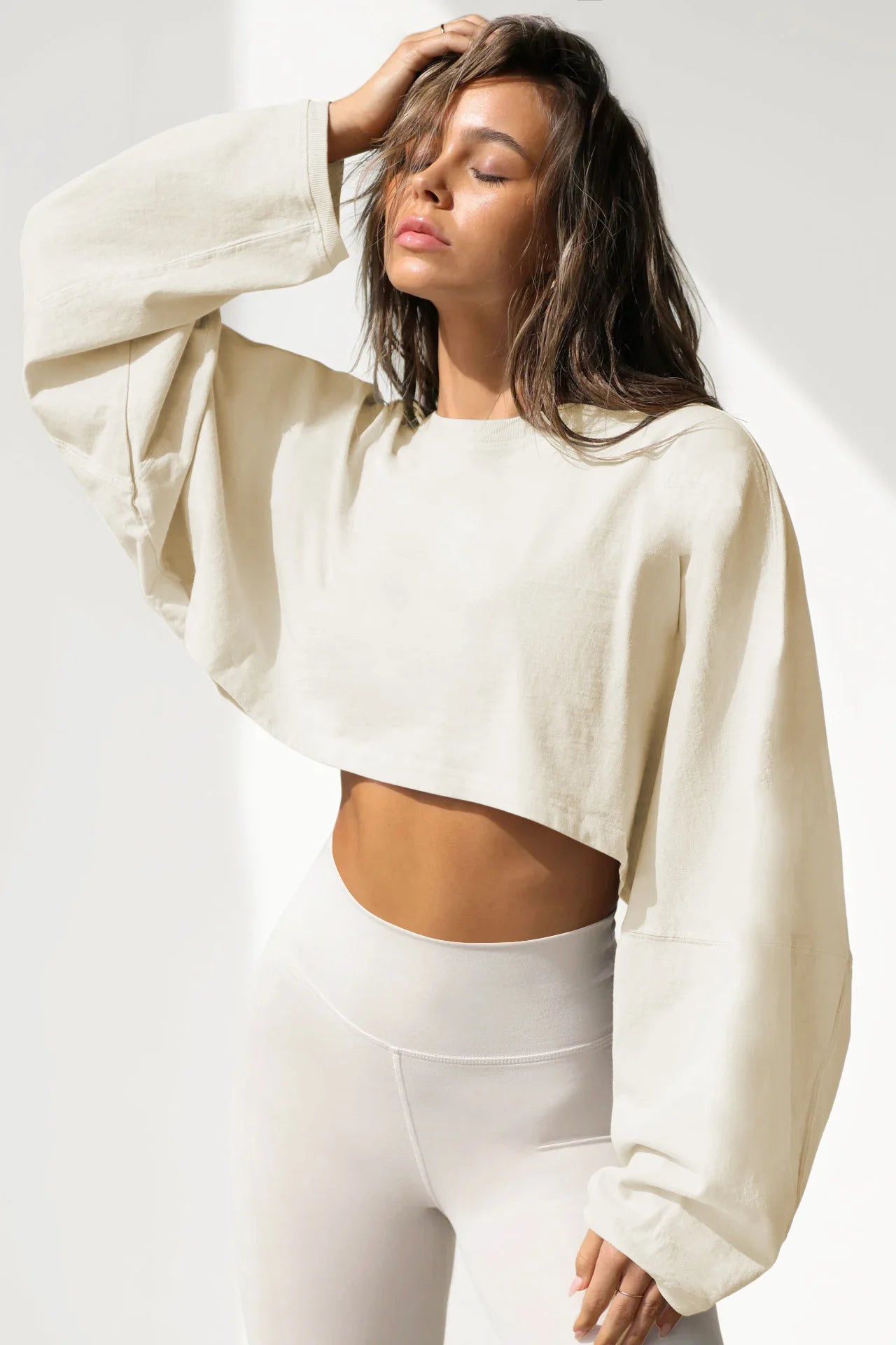 Xooie Fit women's baggy crop top in beige with long sleeves for a relaxed look