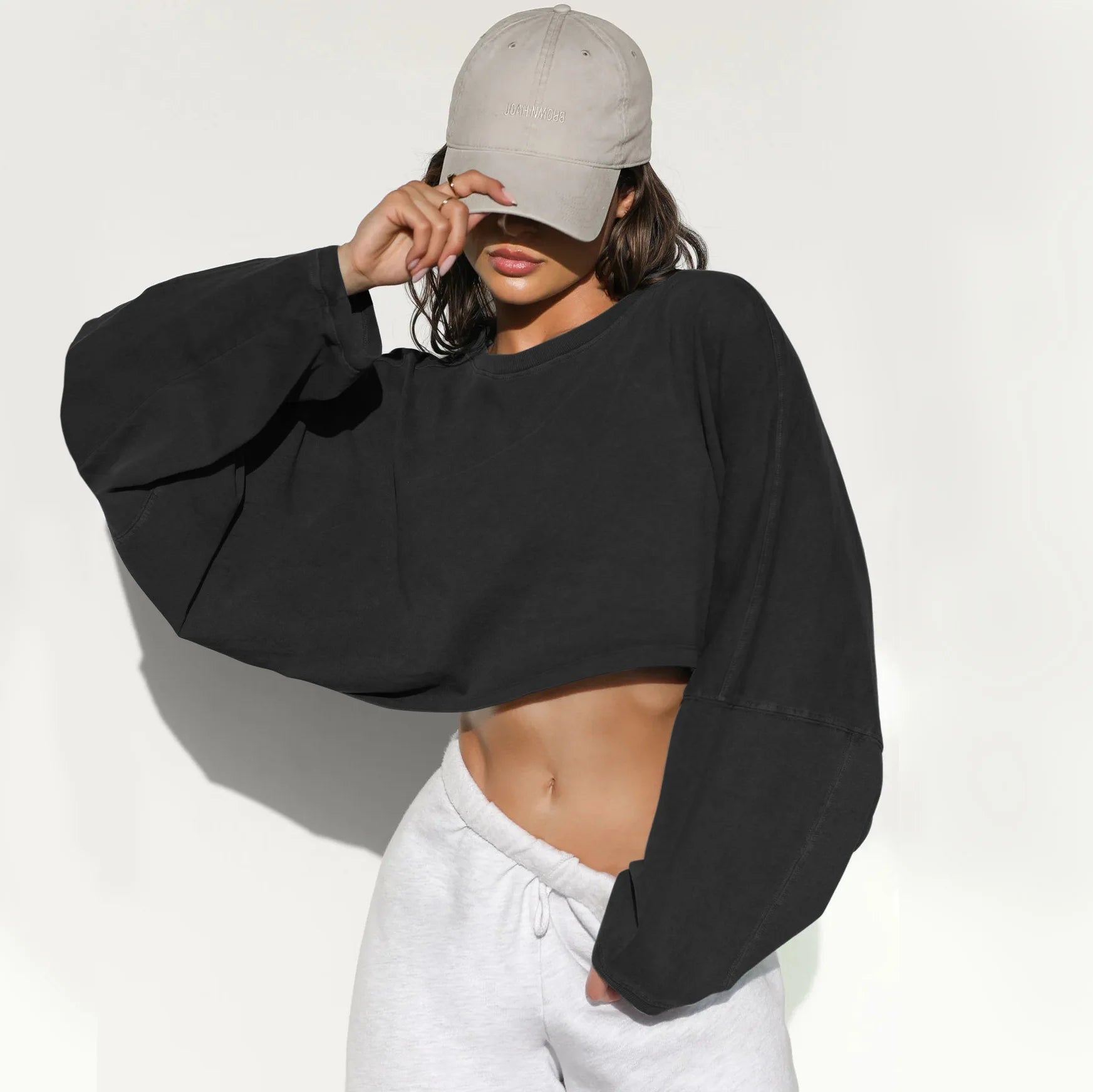 Xooie Fit women's baggy crop top in black with oversized sleeves for a stylish casual look