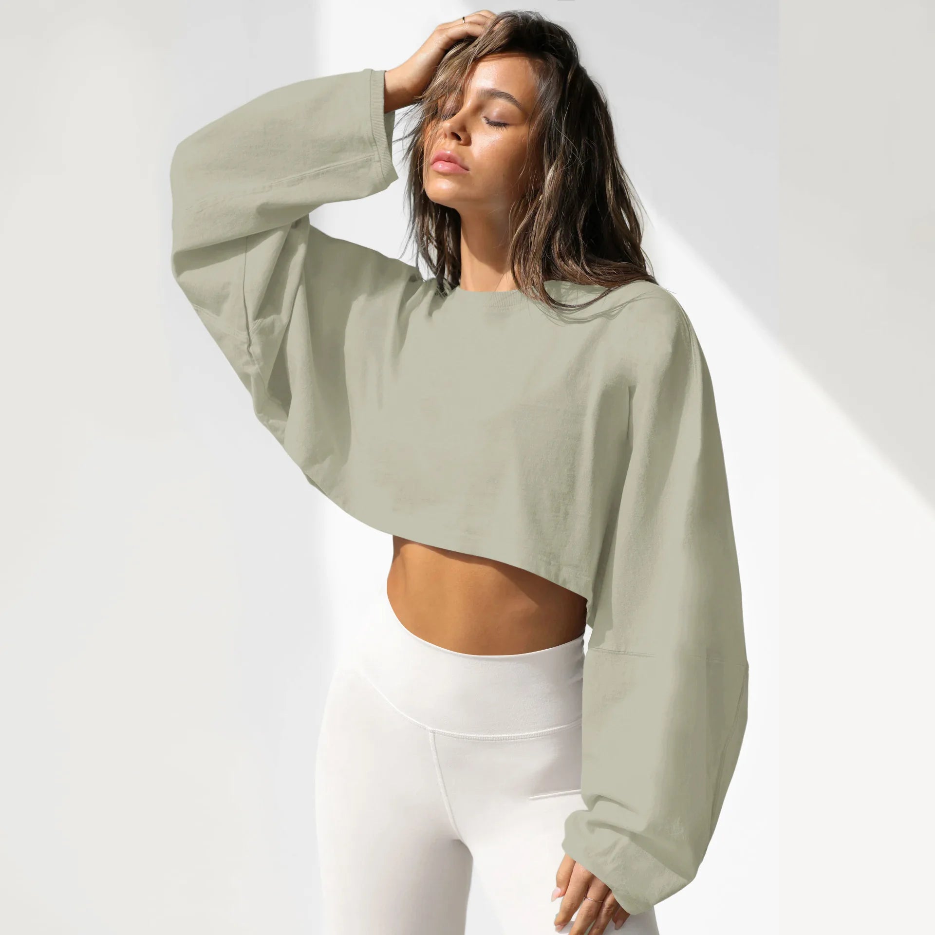 Xooie Fit women's baggy crop top in light green with long sleeves for a comfortable, stylish look