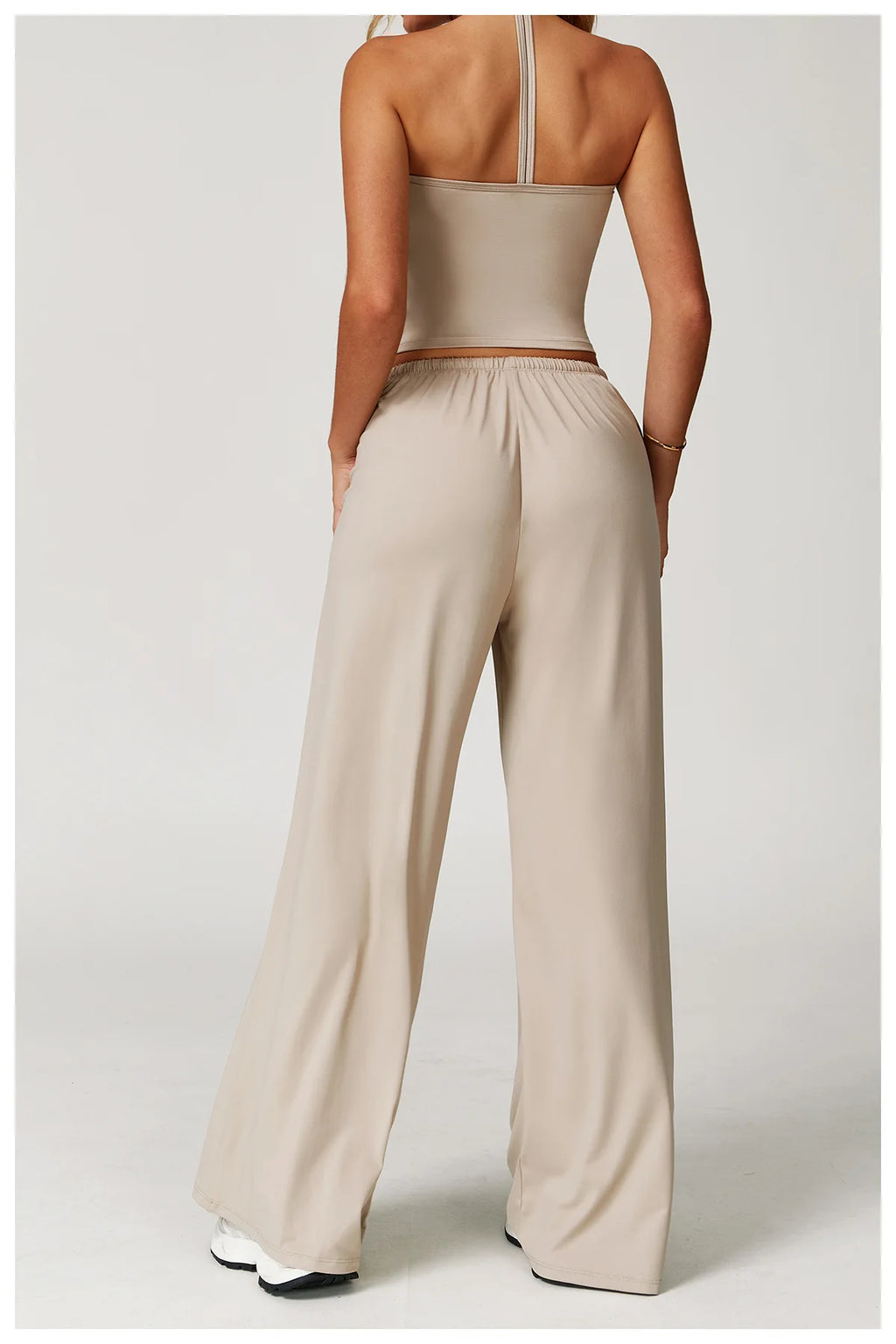 Xooie Fit women's baggy workout pants in beige with a comfortable fit for active lifestyles
