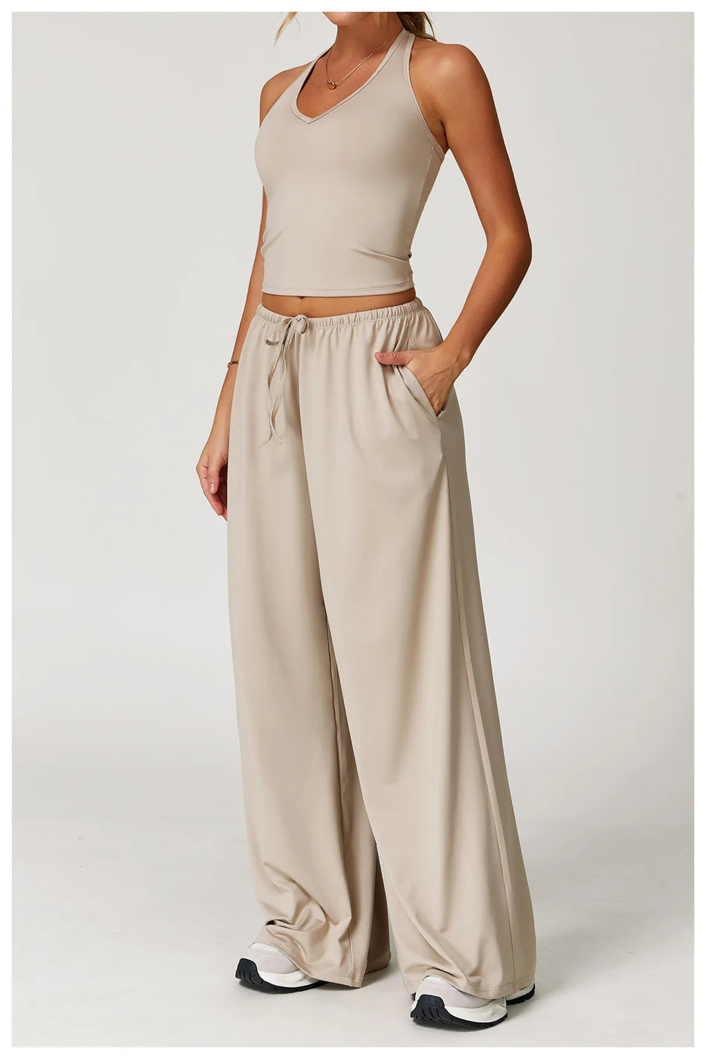Xooie Fit women's baggy workout pants in beige with pockets and a loose fit for comfort during workouts