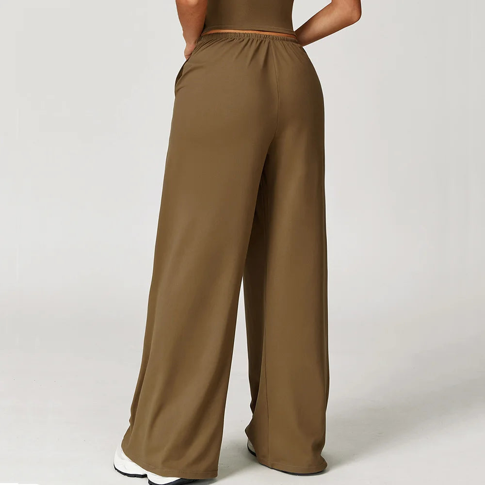 Xooie Fit women's baggy workout pants in olive green with a comfortable elastic waistband