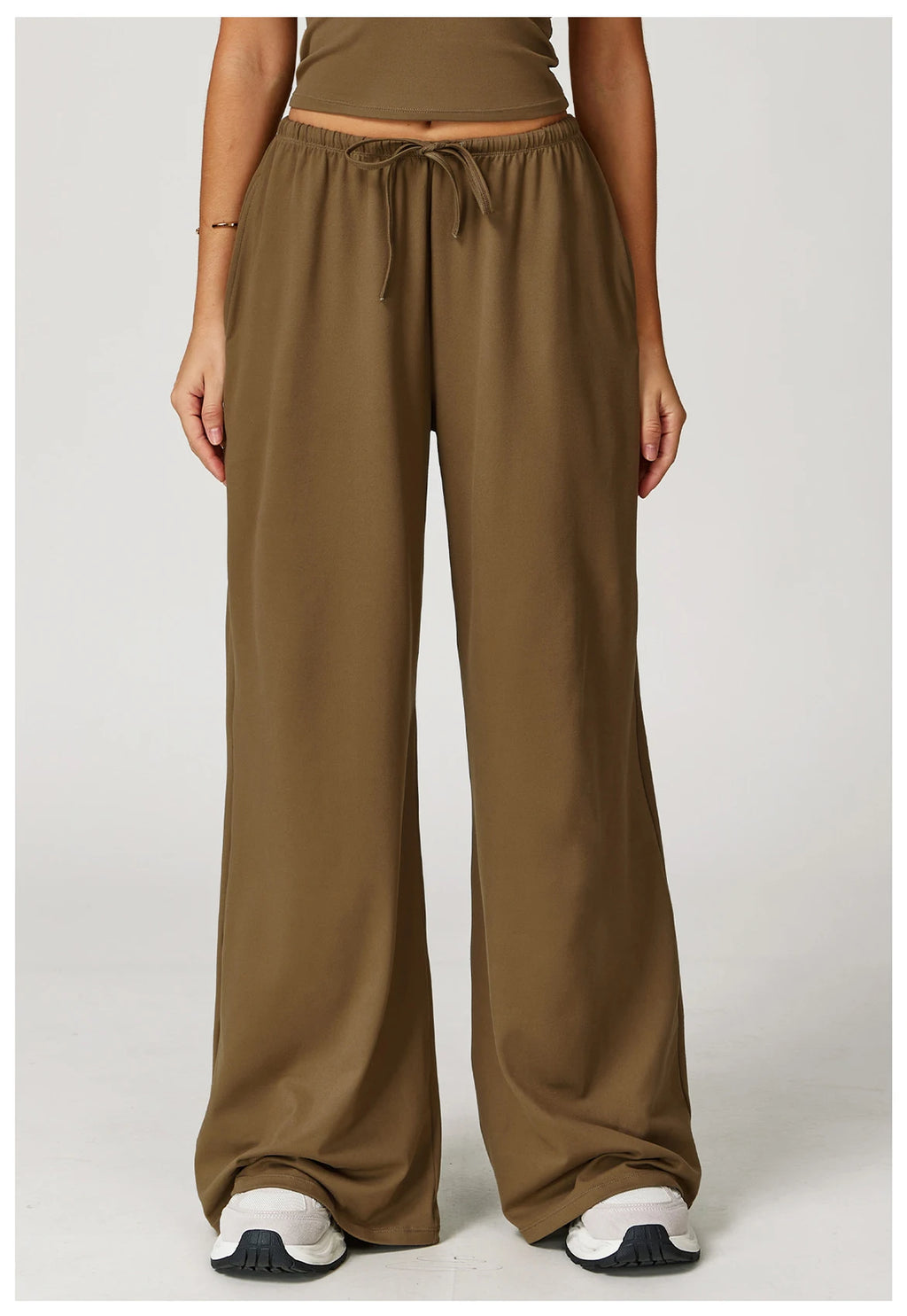 Xooie Fit women's baggy workout pants in olive green with a relaxed fit and drawstring waist
