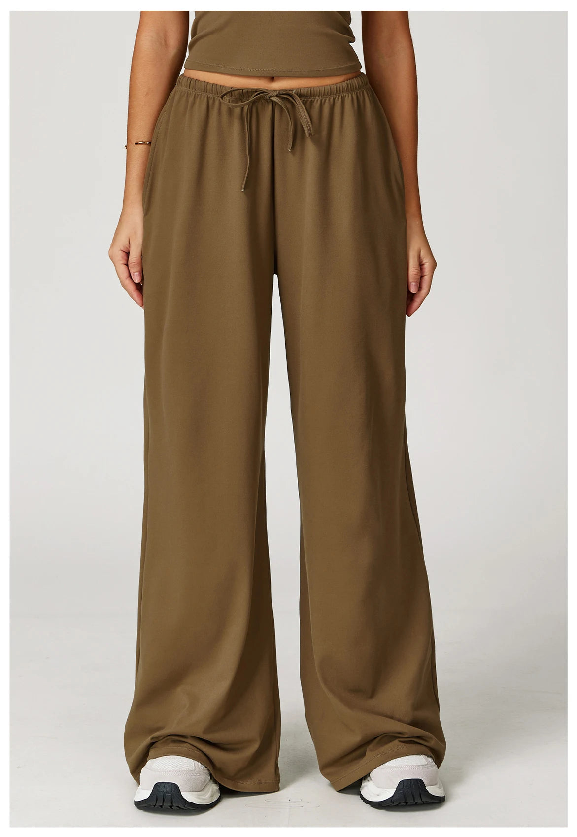 Xooie Fit women's baggy workout pants in olive green with a relaxed fit and drawstring waist