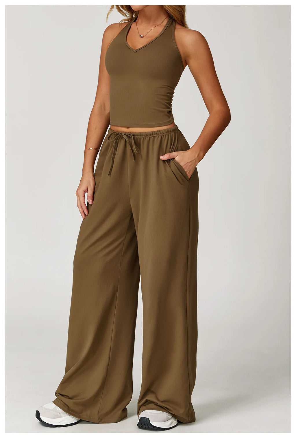 Xooie Fit women's baggy workout pants in olive green with a comfortable fit and side pockets