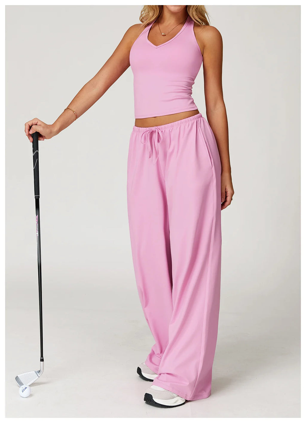 Xooie Fit women's baggy workout pants in pink designed for comfort during fitness activities