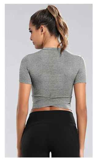 Xooie Fit women's criss-cross crop top in gray, featuring a stylish back design and short sleeves