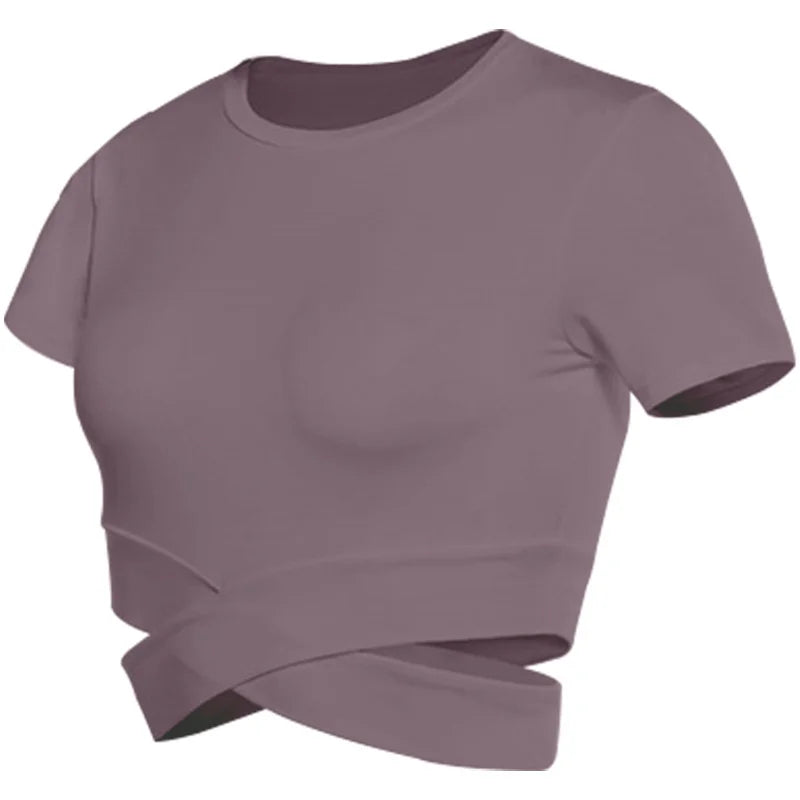 Xooie Fit women's criss-cross crop top in muted purple for stylish and comfortable workouts