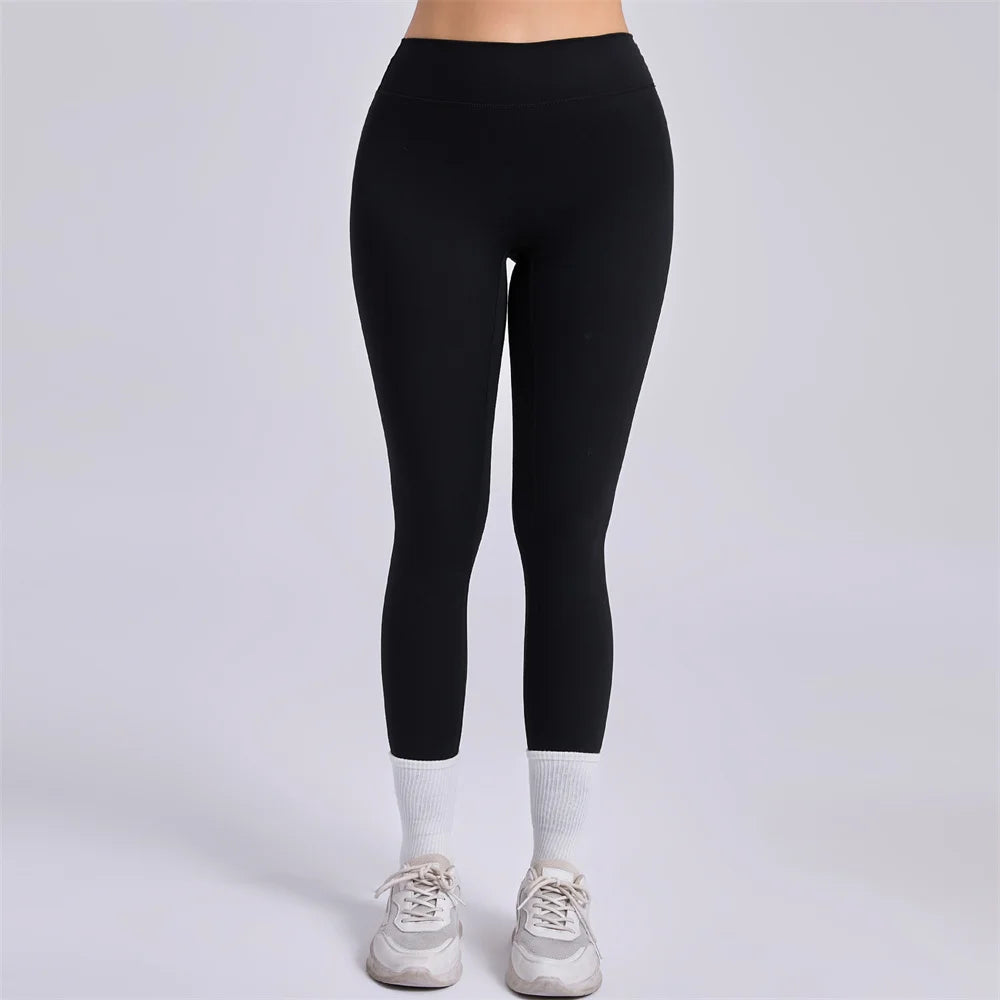 Xooie Fit women's fitness clothing set featuring sleek black leggings for activewear