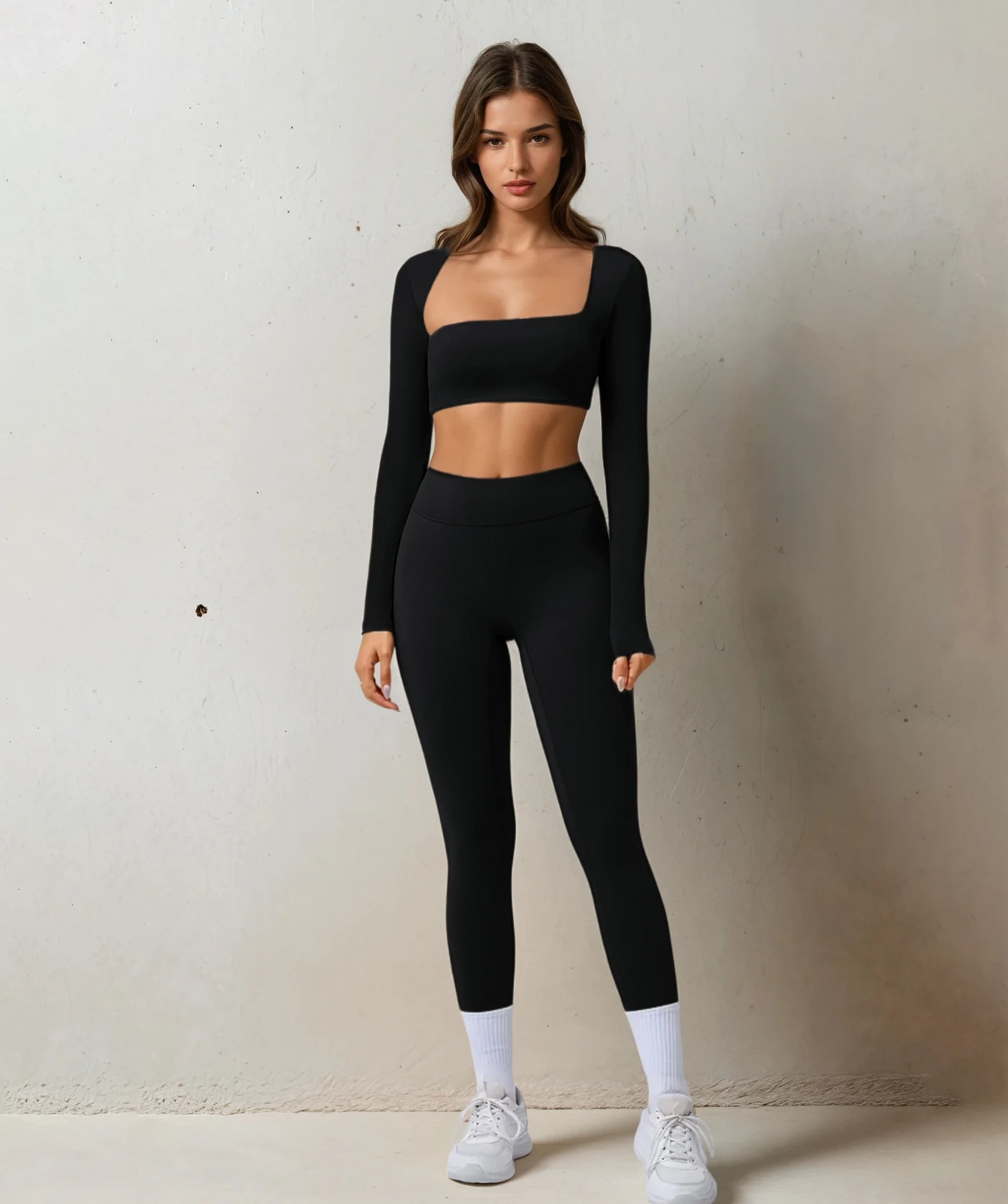 Xooie Fit women's fitness clothing set in black with long sleeves and leggings for activewear enthusiasts