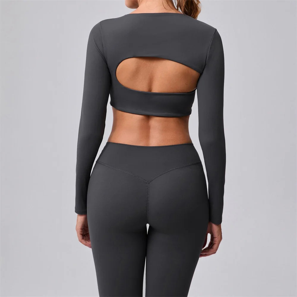 Xooie Fit women's fitness clothing set in gray featuring a stylish back cut-out design