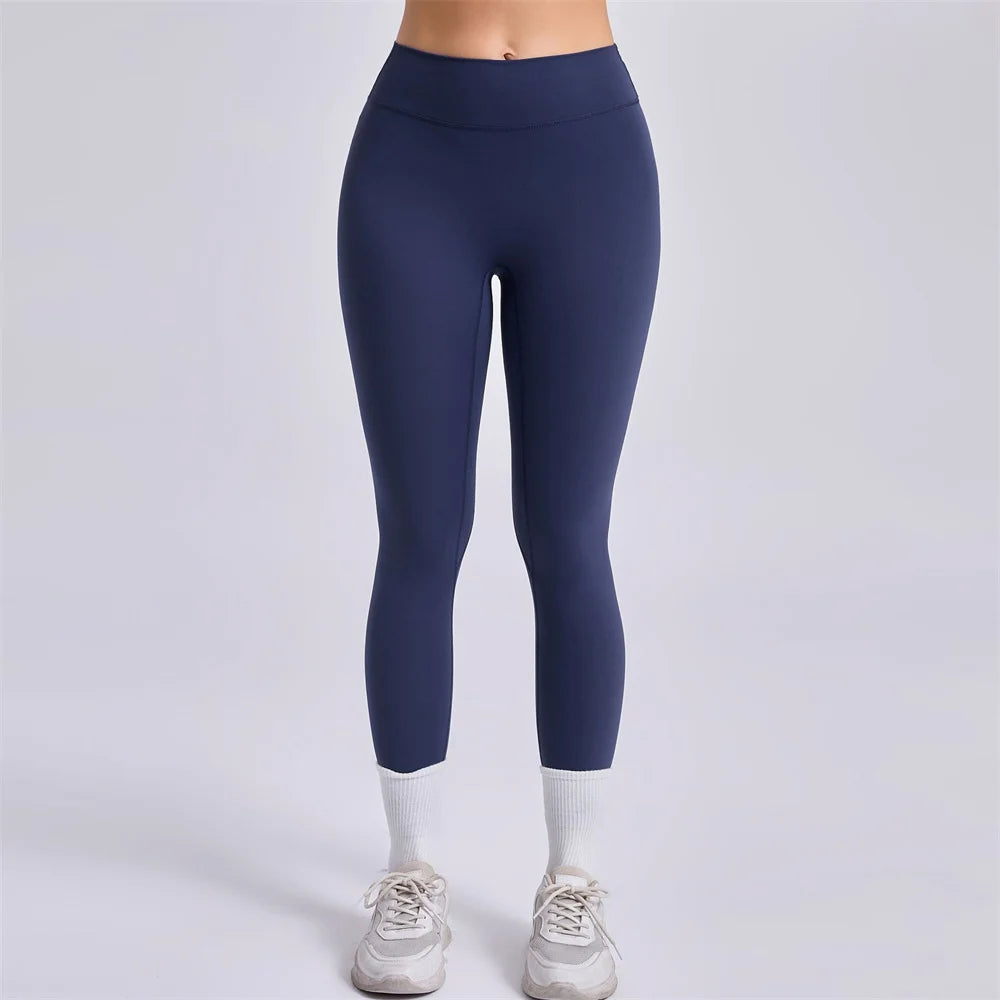 Xooie Fit Women's Fitness Clothing Set featuring navy leggings for activewear comfort