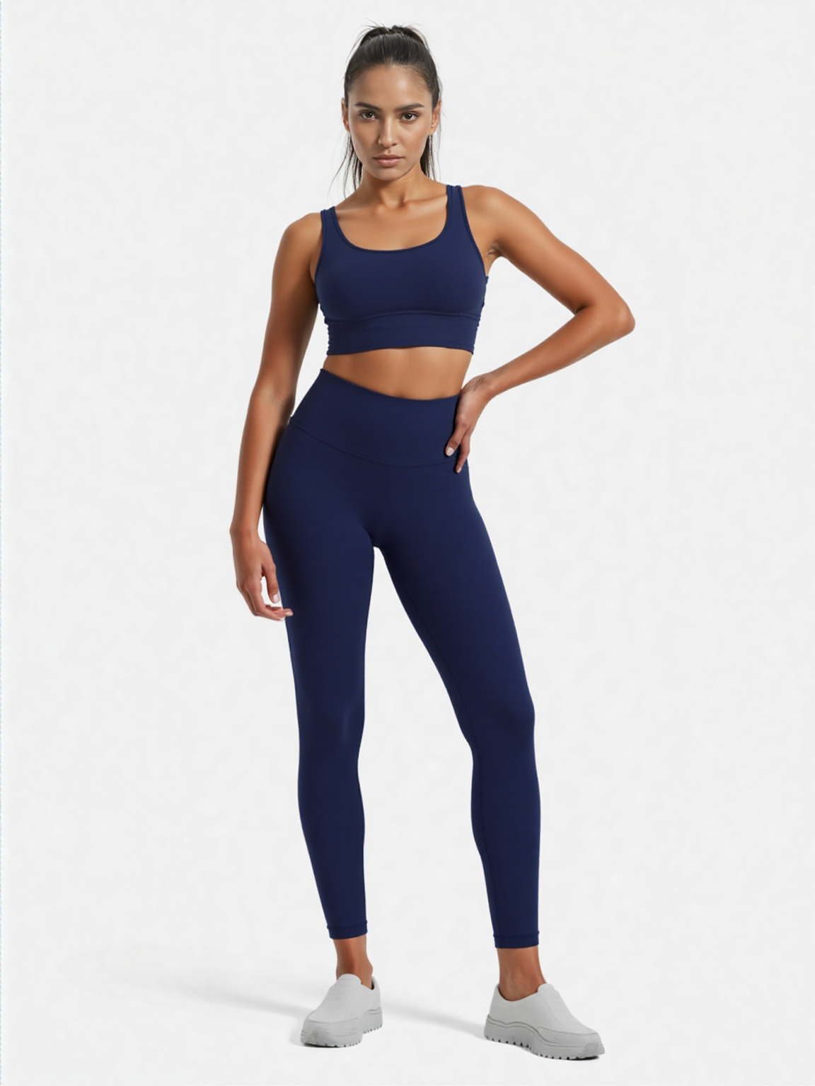 Navy Xooie Fit women's fitness clothing set featuring a crop top and high-waisted leggings