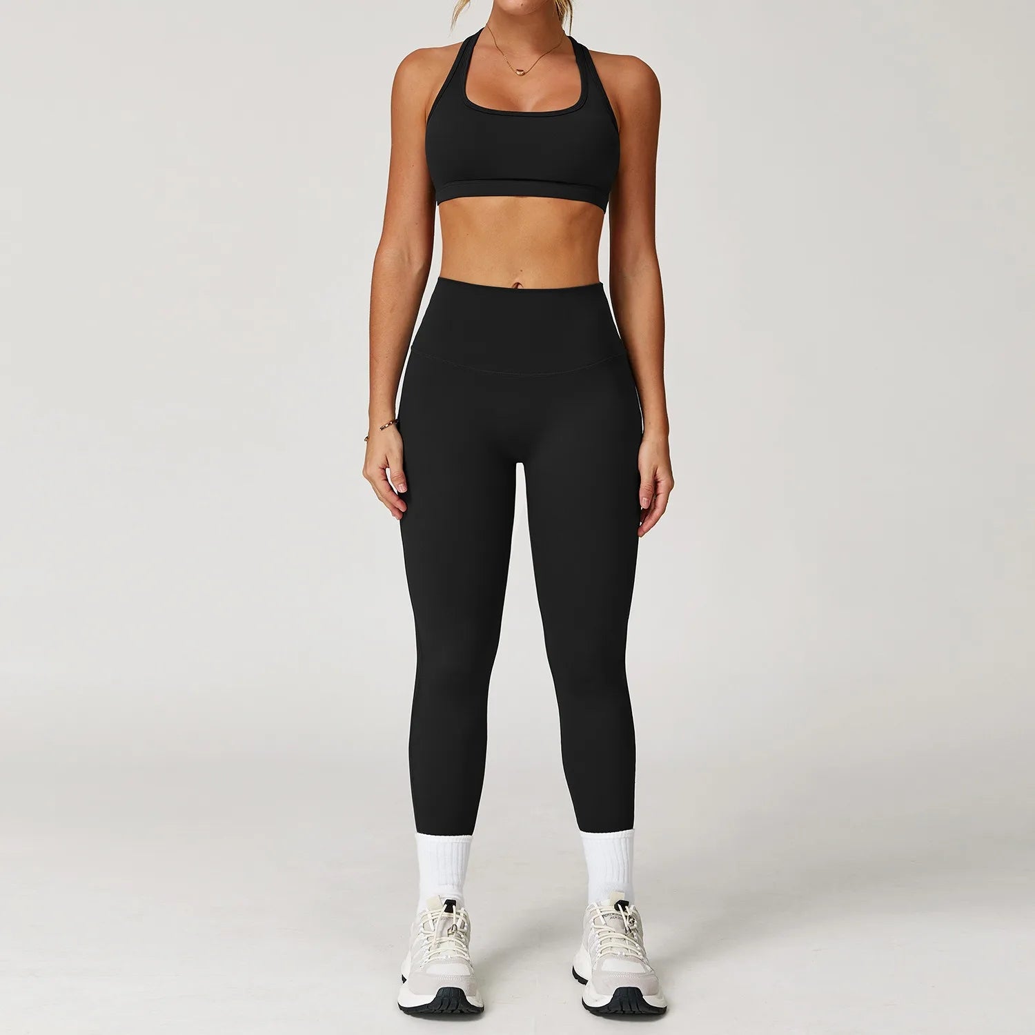 Xooie Fit black women's fitness matching set with crop top and high-waisted leggings