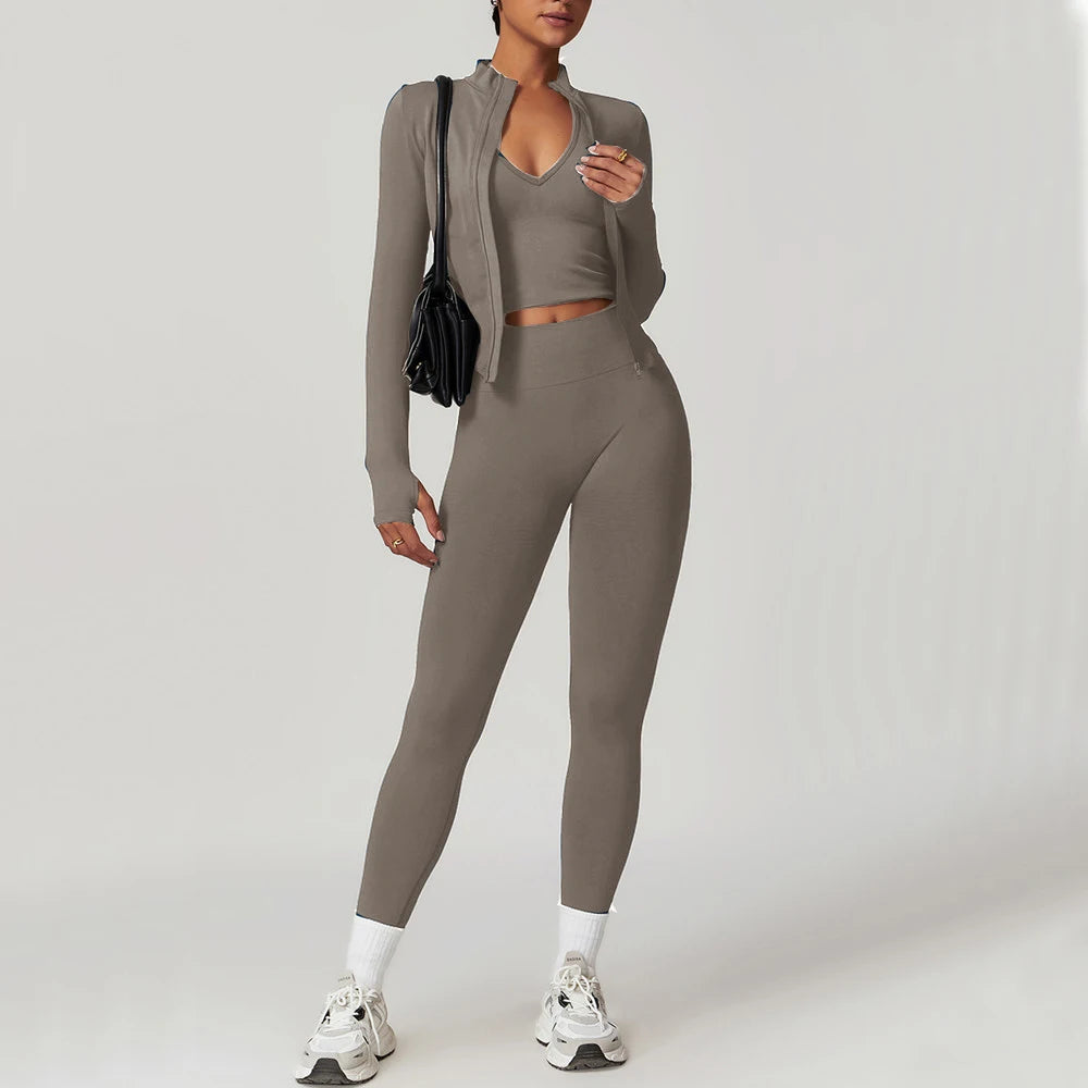 Xooie Fit women's fitness matching set in gray featuring a crop top, leggings, and an open-front jacket