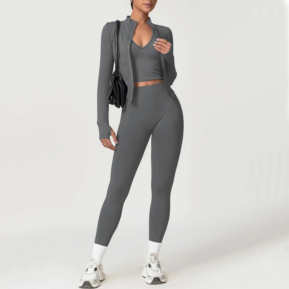 Xooie Fit women's fitness matching set in gray with crop top, leggings, and zip-up jacket