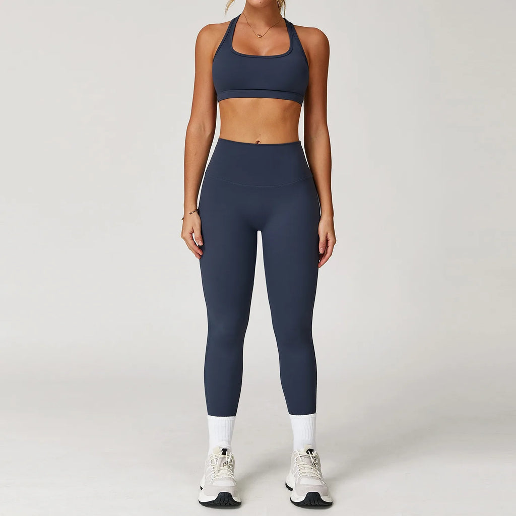 Xooie Fit women's fitness matching set with navy sports bra and high-waisted leggings