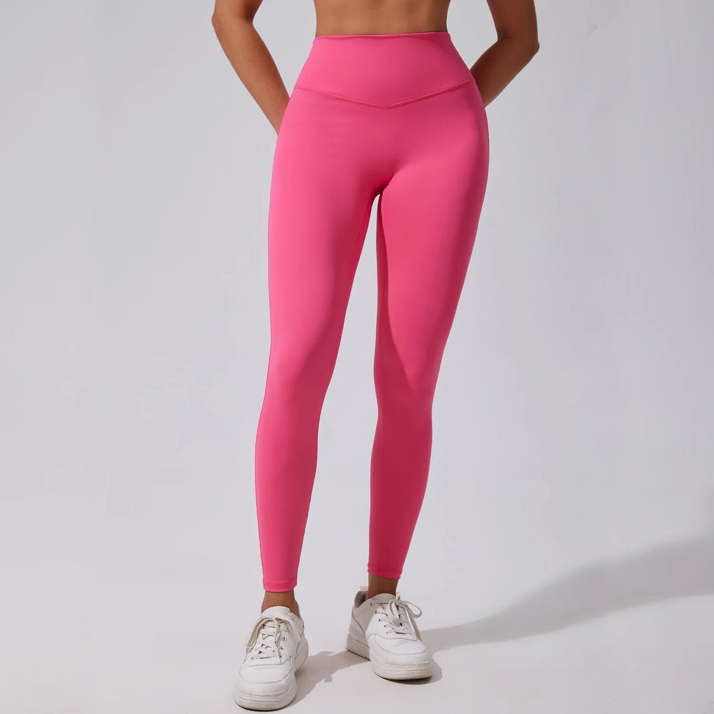 Xooie Fit Women's Fitness Matching Set featuring vibrant pink leggings for stylish workouts