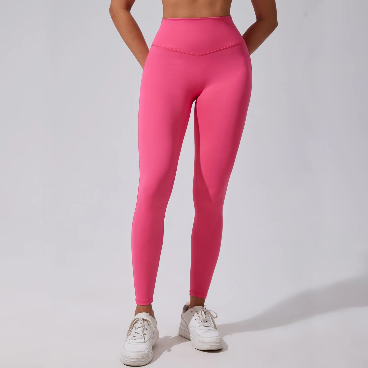 Xooie Fit Women's Fitness Matching Set featuring vibrant pink leggings for stylish workouts