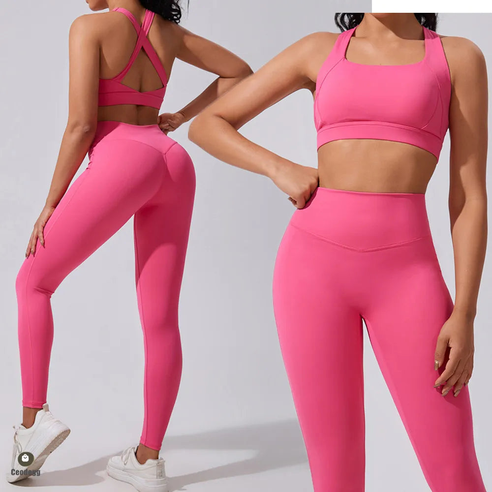 Xooie Fit women's fitness matching set in pink featuring a stylish crop top and high-waisted leggings