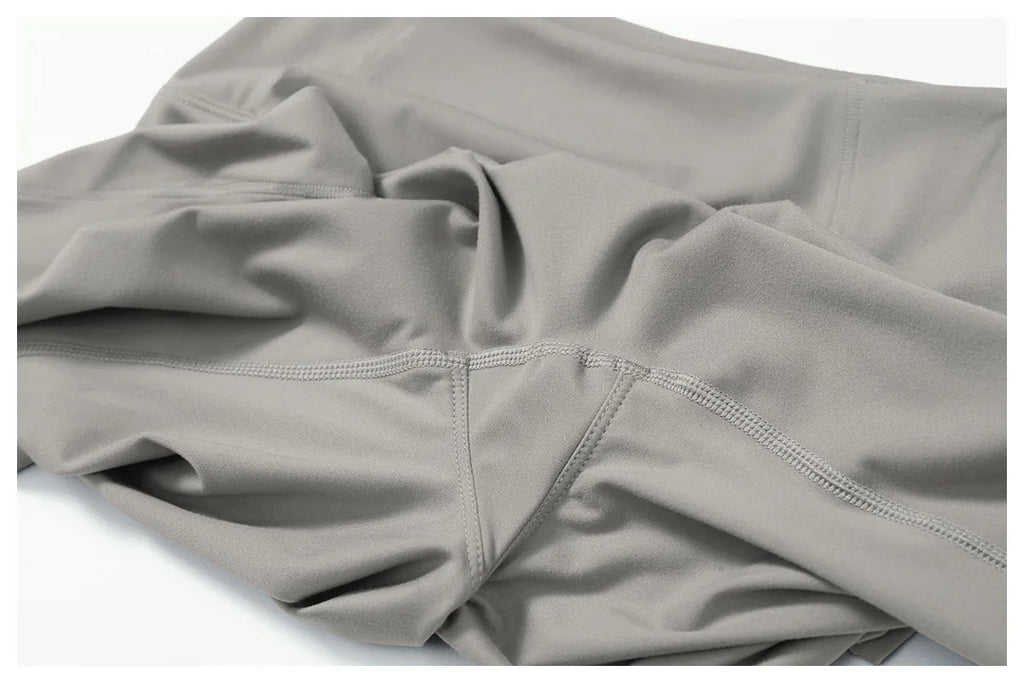 Women's fitness two-piece set in soft grey fabric, ideal for workouts and casual wear pants2