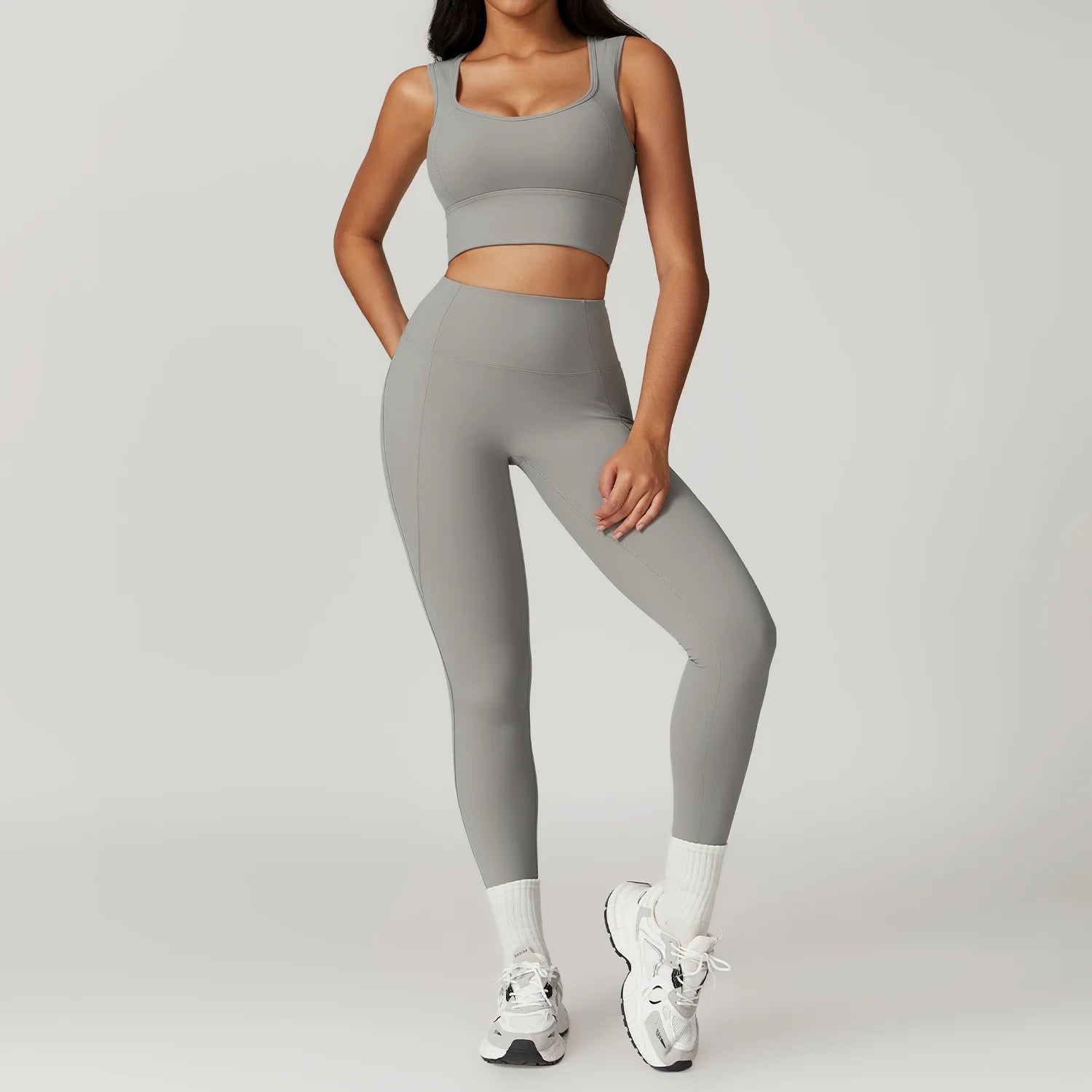 Xooie Fit women's fitness two-piece set in grey, featuring a cropped top and high-waisted leggings