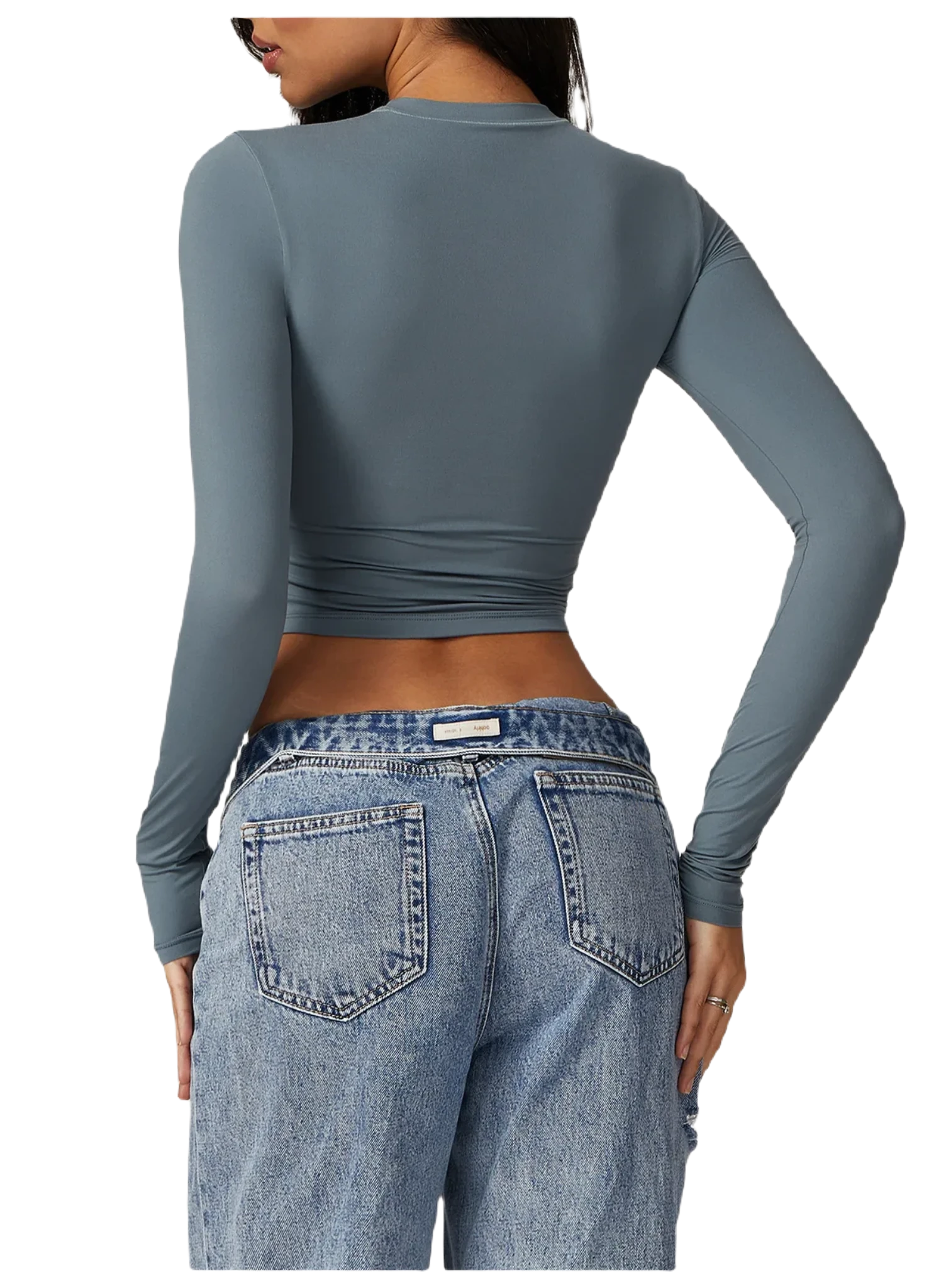 Back view of Xooie Fit women's fitted long-sleeve shirt in gray paired with high-waisted jeans