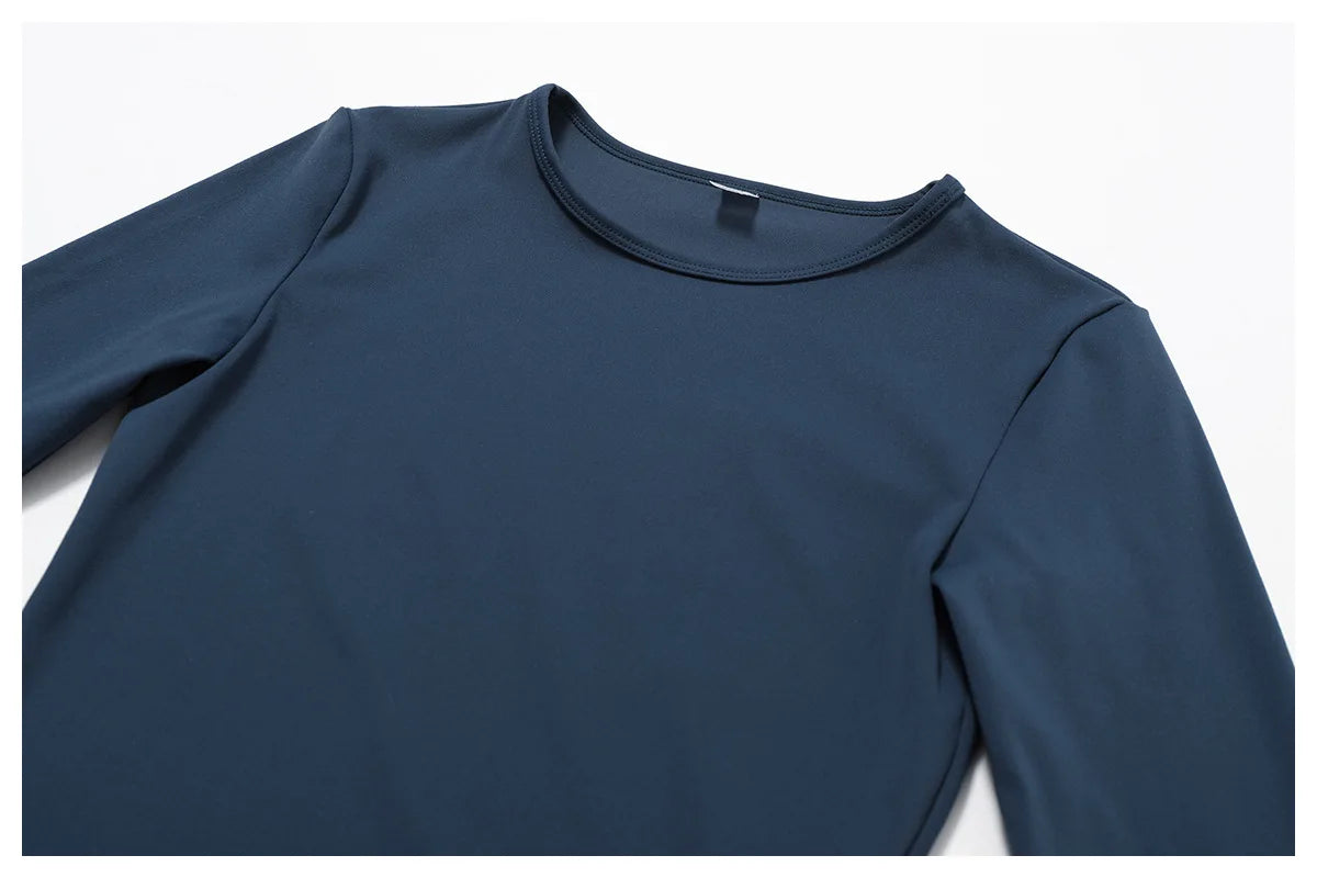 Xooie Fit women's fitted long sleeve tee in dark blue with a smooth, stylish design