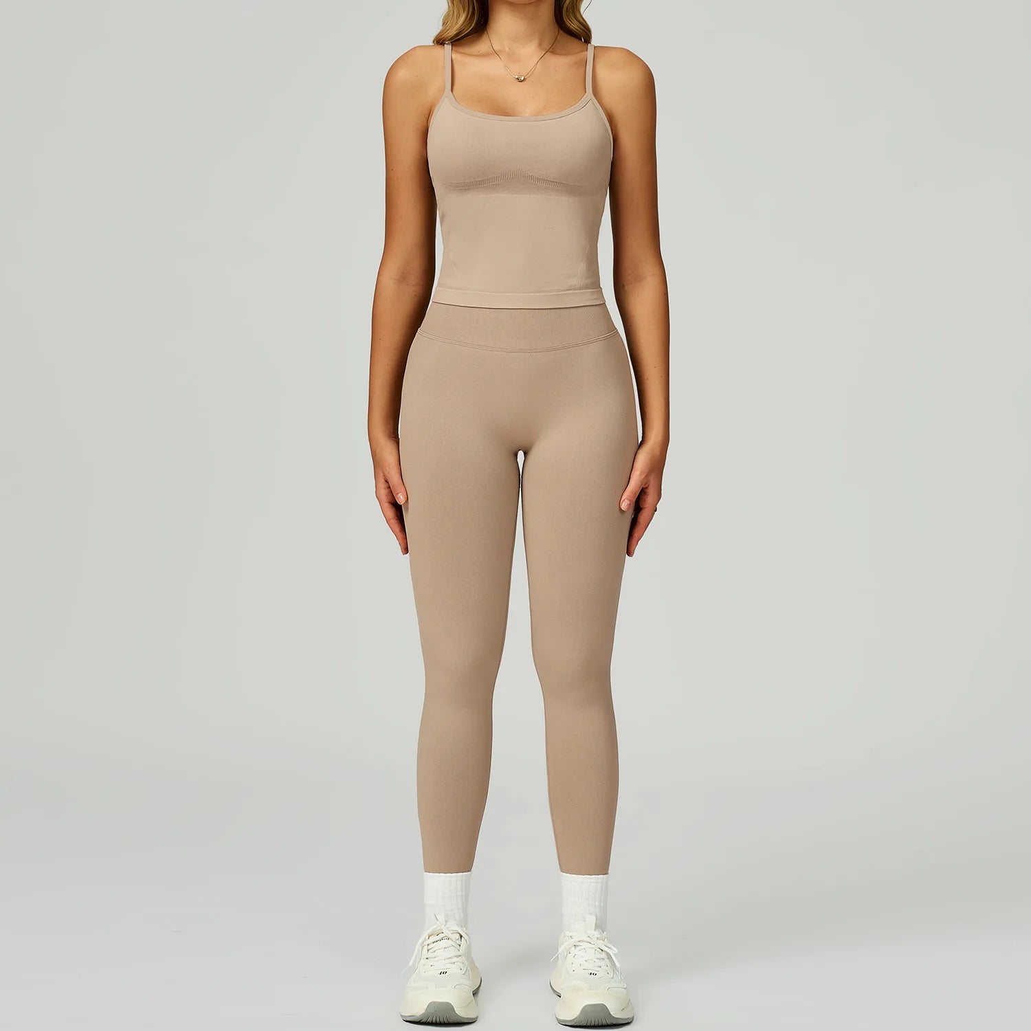 Xooie Fit women's fitted tank top and leggings set in neutral shade for comfortable workouts