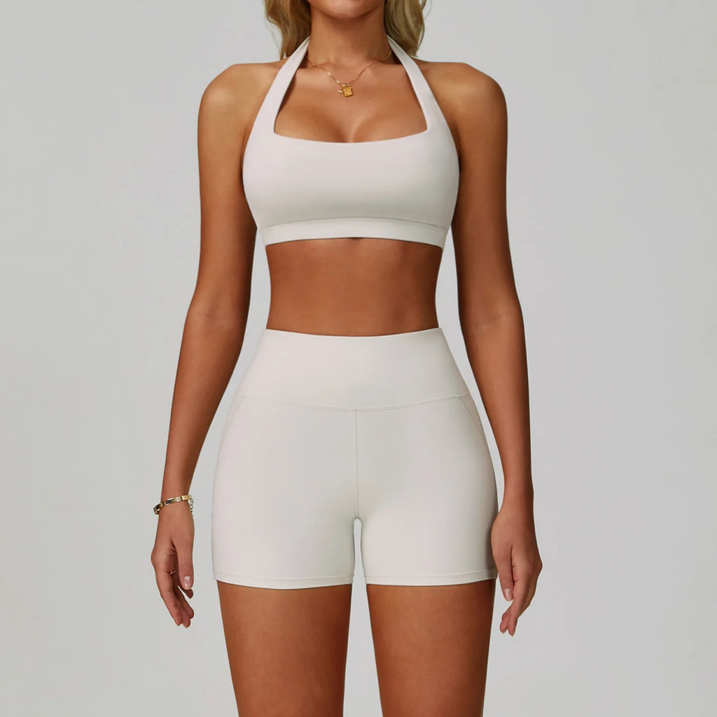 White halter sports bra and matching high-waist active shorts set