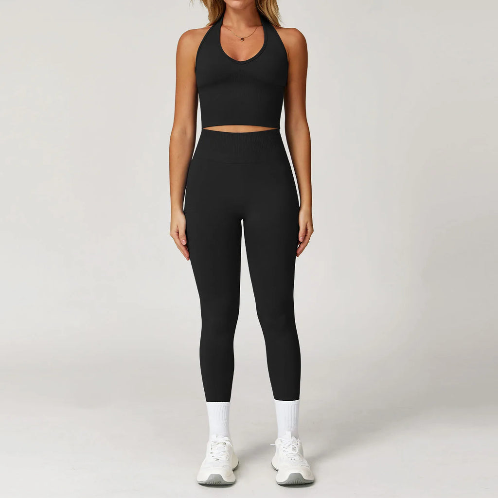 Black halter crop tank and high-waist active leggings set, front view