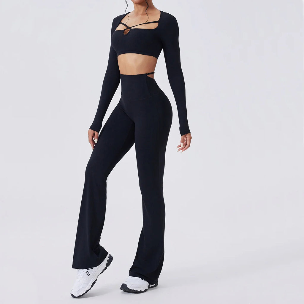 Hourglass Harmony Set in Black: long sleeve crop top with strap cutout, high-rise flared pants