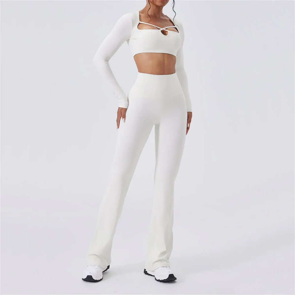 Hourglass Harmony Set in White: long sleeve crop top with chest cutout strap, flared pants