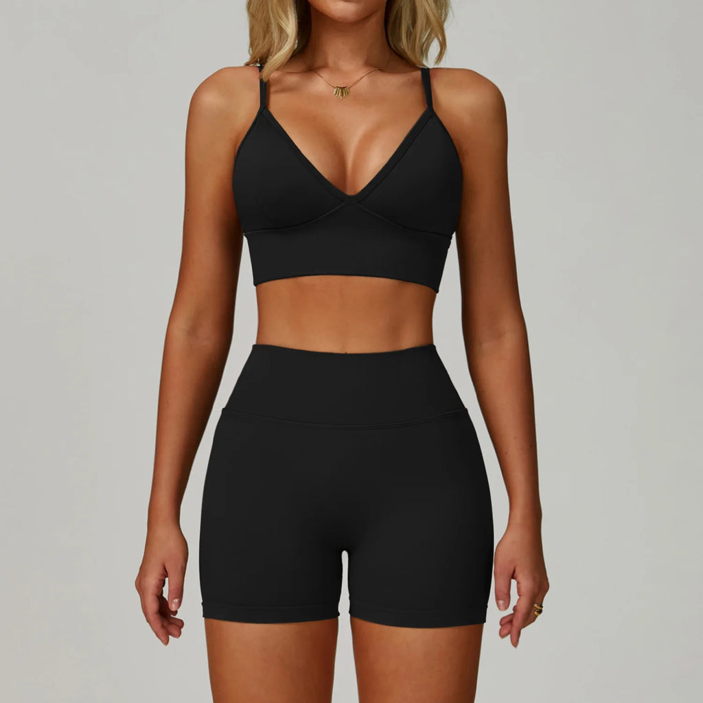 Xooie Fit women's matching activewear set in black featuring a bralette and high-waisted shorts