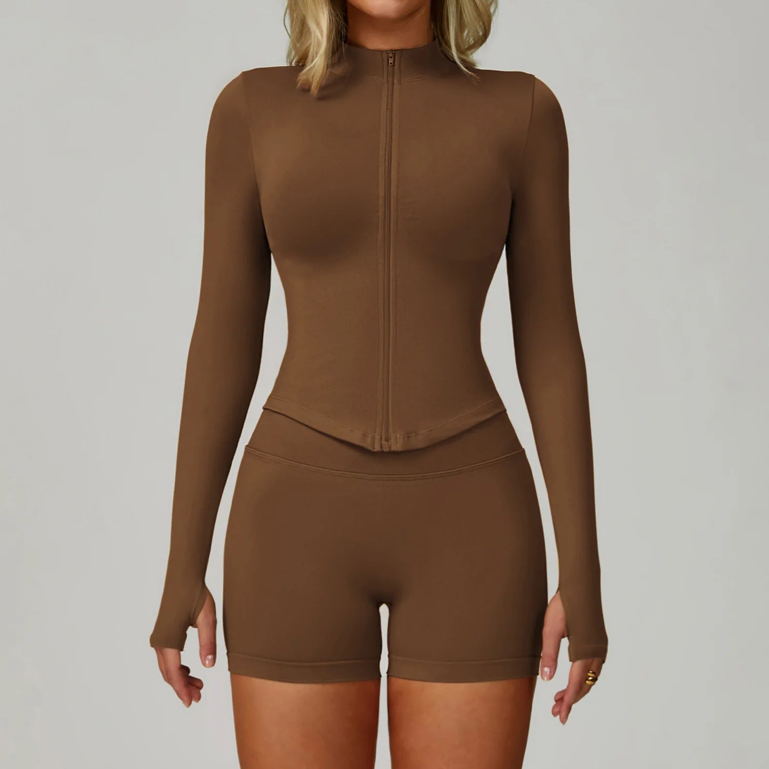 Xooie Fit women's matching activewear set in brown with long sleeves and high waist shorts