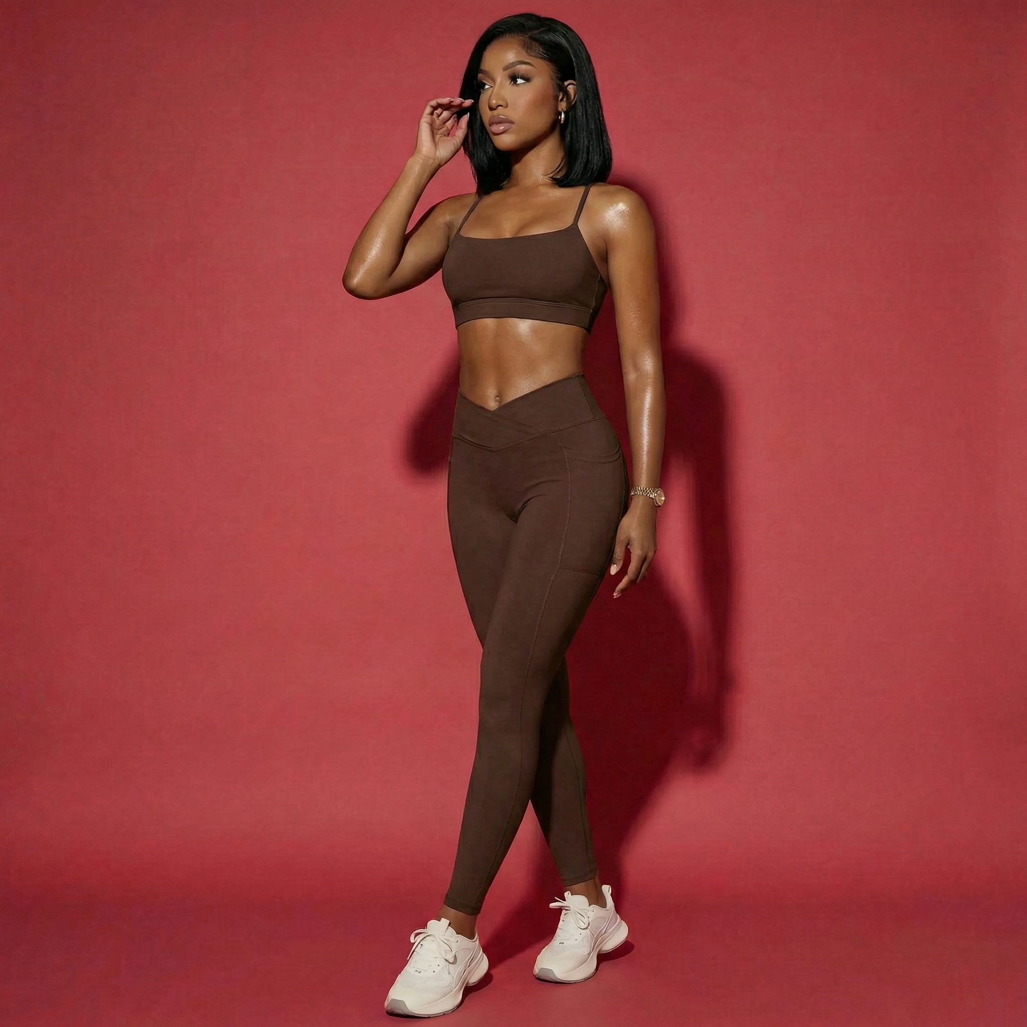 Women's matching activewear set in brown by Xooie Fit featuring a crop top and high-waisted leggings