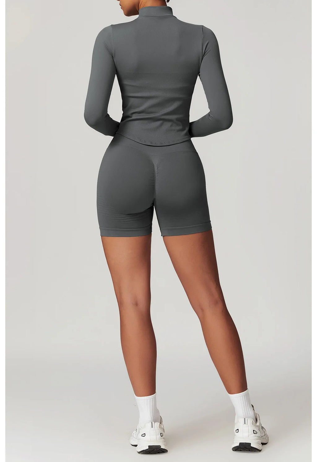 Dark grey zip-up jacket and matching biker shorts set, back view