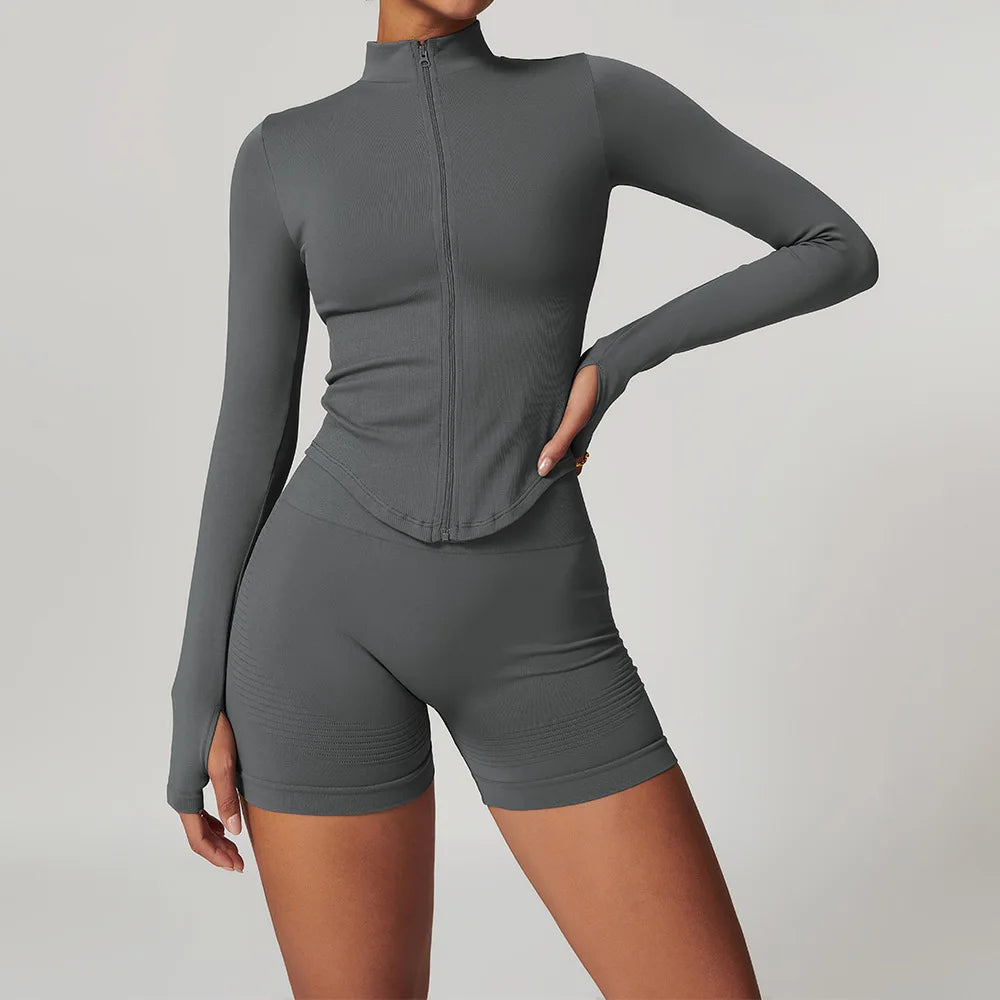 Dark grey zip-up active jacket and matching shorts set, side view