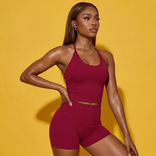 Rose-red sports set: halter-style crop tank with matching high-waist shorts