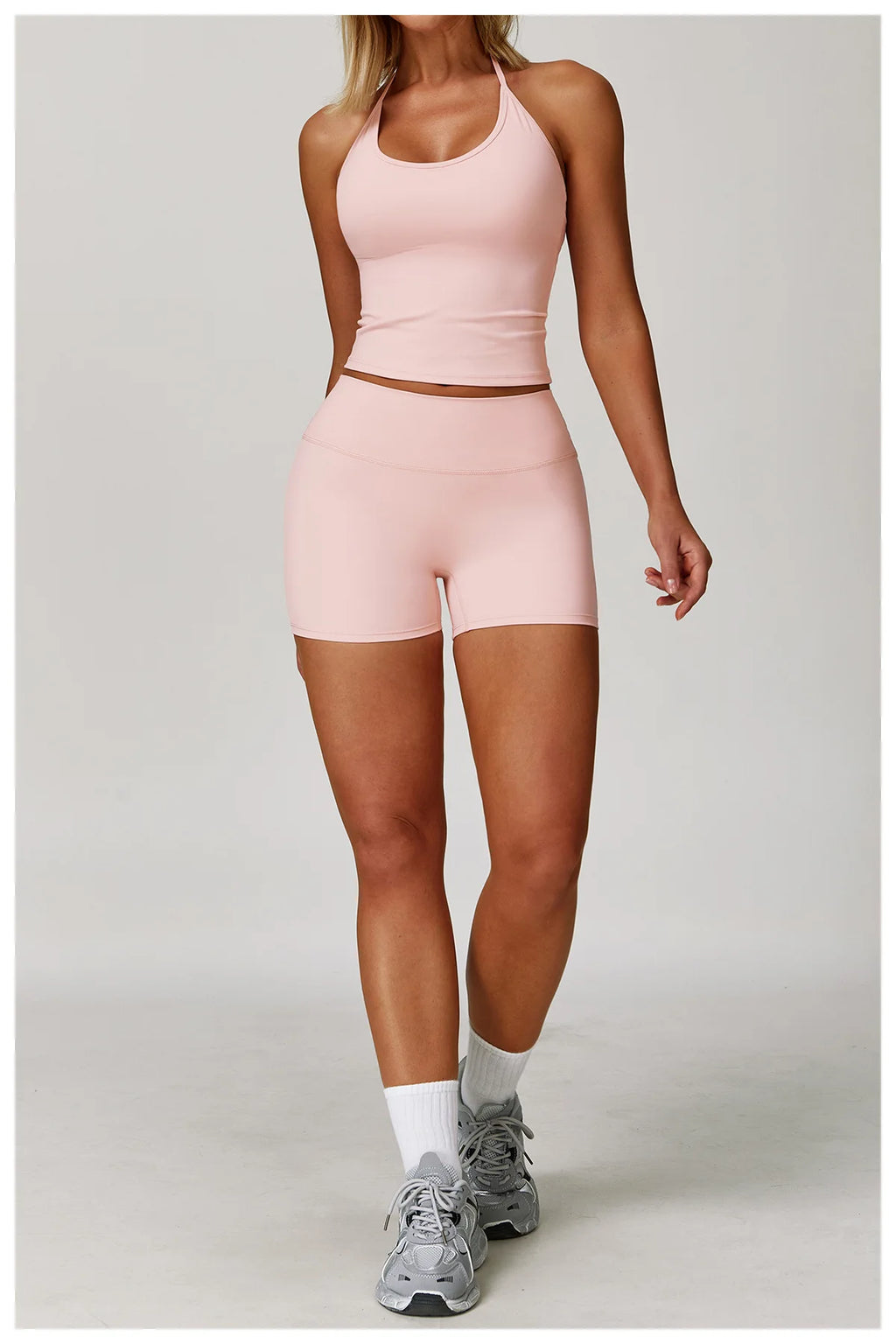 Xooie Fit women's matching activewear set in soft pink, perfect for workouts and exercising