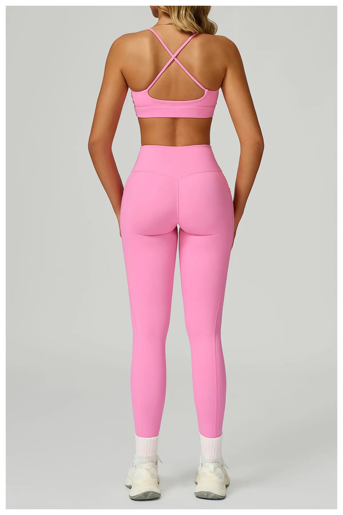 Pink set: X-back sports bra with high-rise pocket leggings, back view