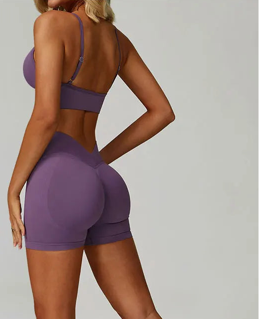 Xooie Fit women's matching activewear set featuring a supportive sports bra and comfortable shorts in purple