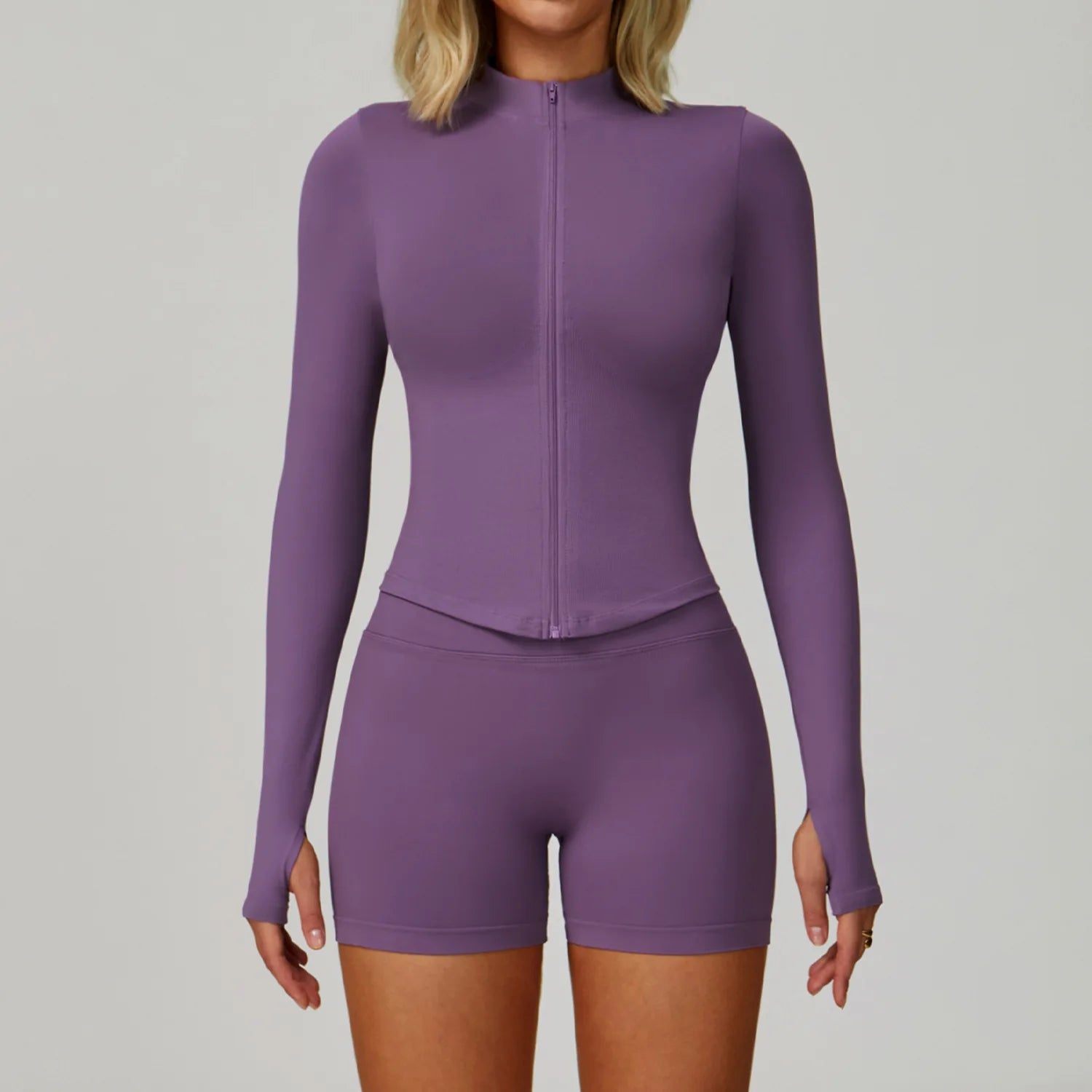 Xooie Fit women's matching activewear set in purple with long sleeves and shorts for comfortable workouts
